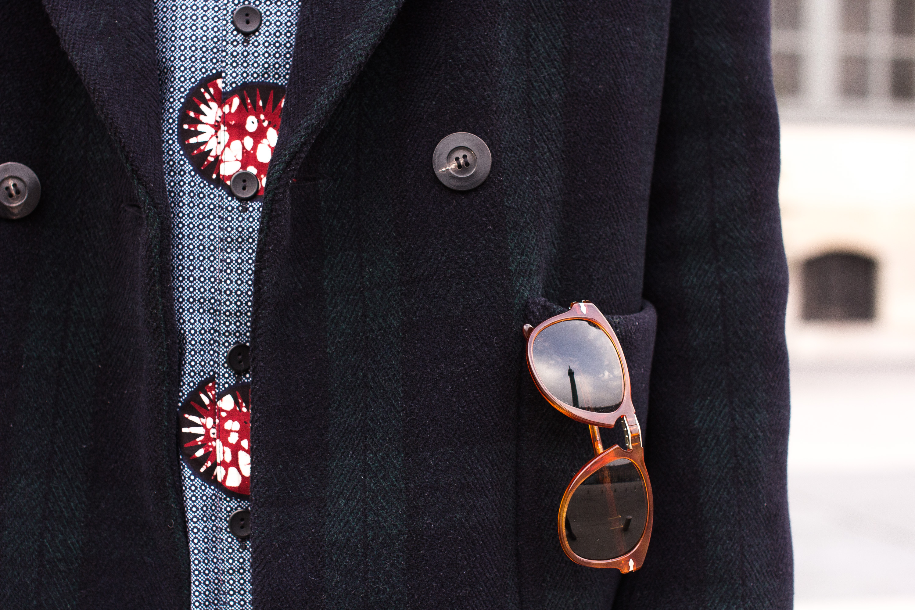 Patrons Woollen Coat details with Persol sunglasses